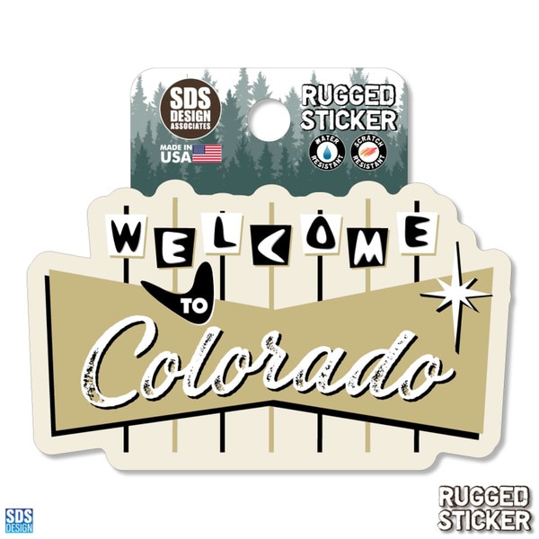 Retro-style “Welcome to Colorado” rugged sticker with black and gold lettering and vintage sign design.